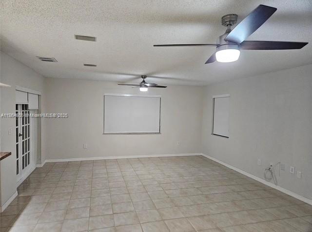 14763 Southwest 152nd Place Miami, FL 33196 - Photo 6 of 30 an empty room with closet and windows