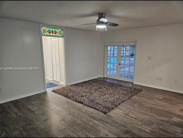 14763 Southwest 152nd Place Miami, FL 33196 - Photo 9 of 30 an empty room with wooden floor chandelier and window
