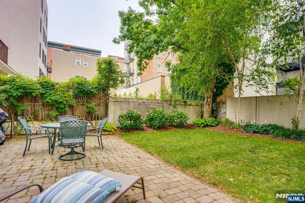 608 Madison Street, Unit 2 Hoboken, NJ 07030 - Photo 17 of 24 a garden view with a seating space