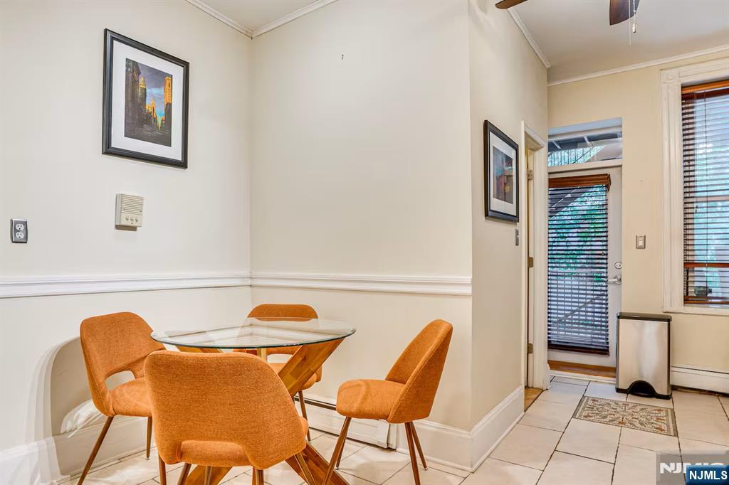 608 Madison Street, Unit 2 Hoboken, NJ 07030 - Photo 6 of 24 a chair and a table in a room