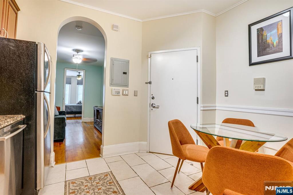 608 Madison Street, Unit 2 Hoboken, NJ 07030 - Photo 9 of 24 a view of a livingroom with furniture and front door