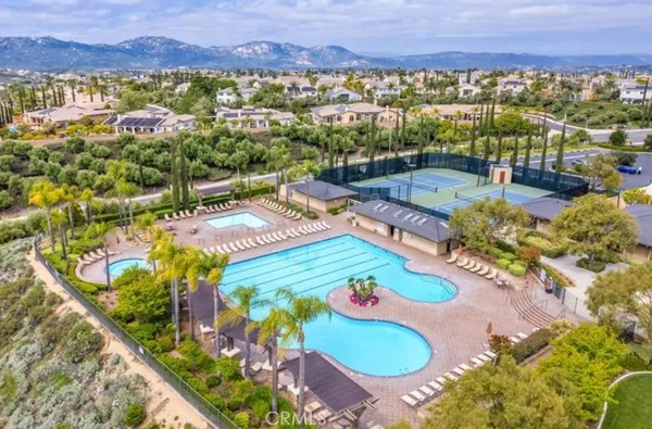 a view of a chairs and table in the patio