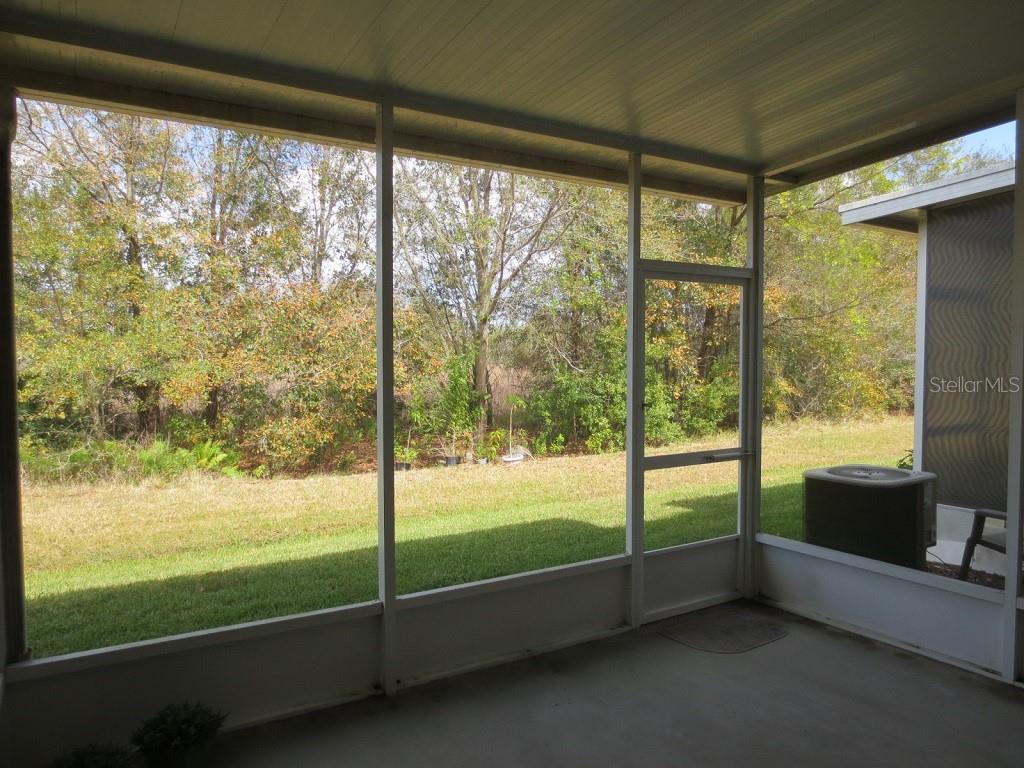 1038 Vista Cay Court Brandon, FL 33511 - Photo 6 of 13 a view of an empty room and window