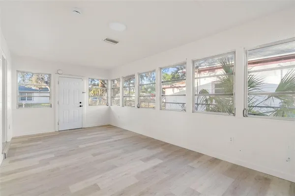 a kitchen with stainless steel appliances granite countertop a stove and a refrigerator