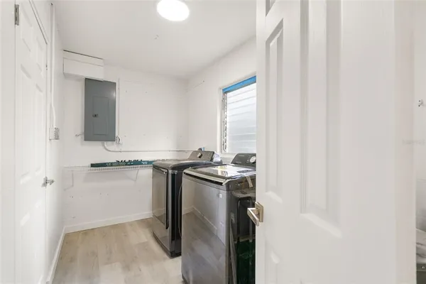 a backyard of a house with lots of green space