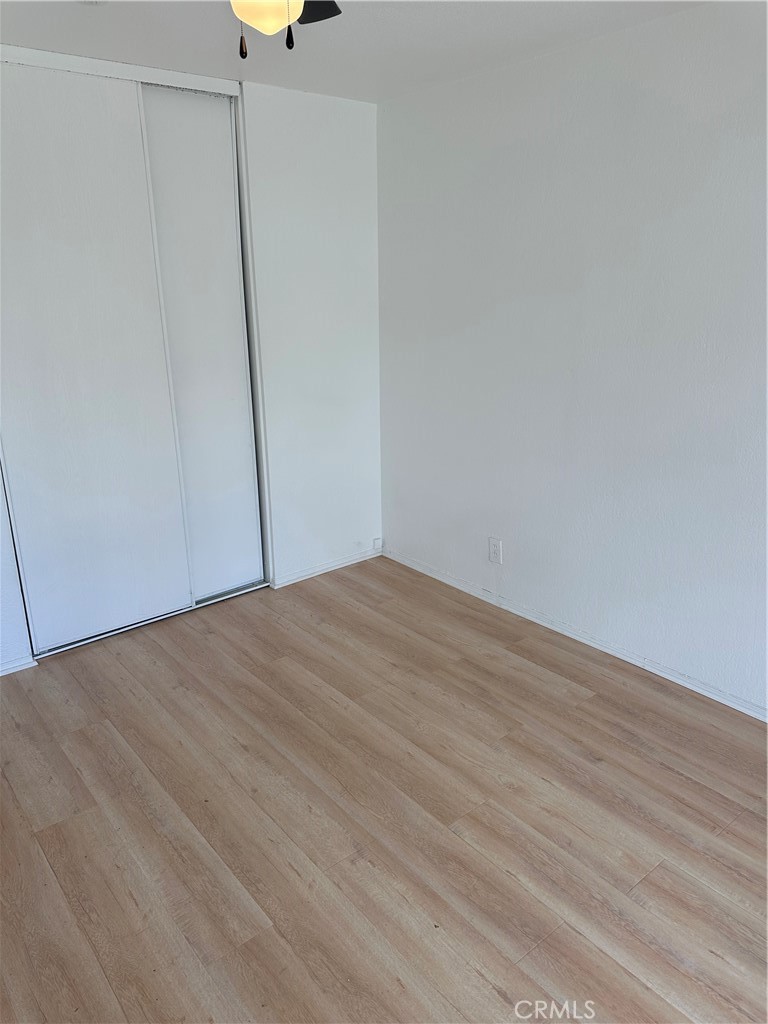 1380 Indian Sage Road Lancaster, CA 93534 - Photo 13 of 24 a view of empty room with wooden floor