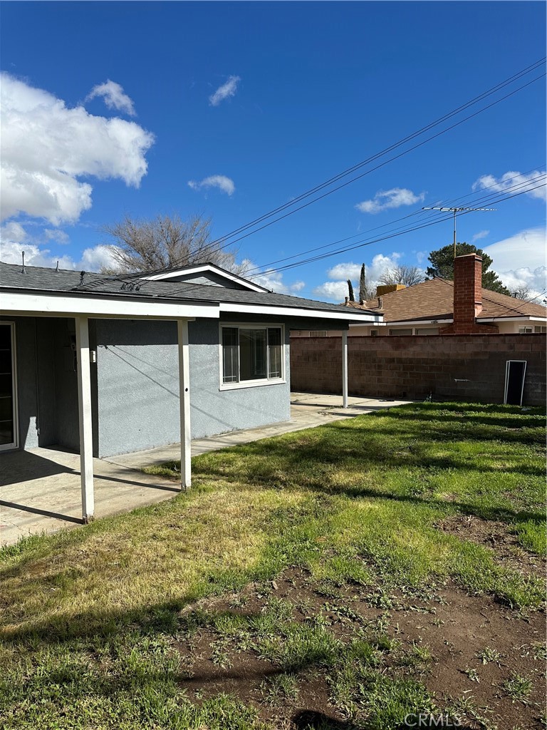 1380 Indian Sage Road Lancaster, CA 93534 - Photo 19 of 24 a front view of a house with a yard