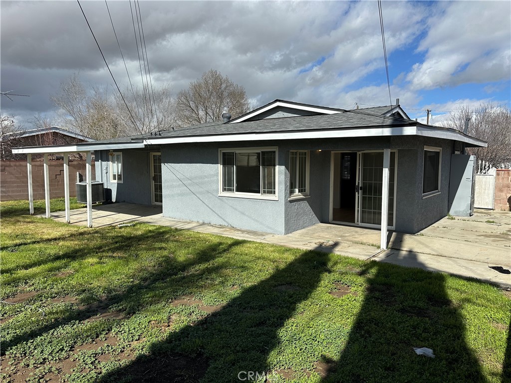 1380 Indian Sage Road Lancaster, CA 93534 - Photo 20 of 24 a front view of a house with a yard