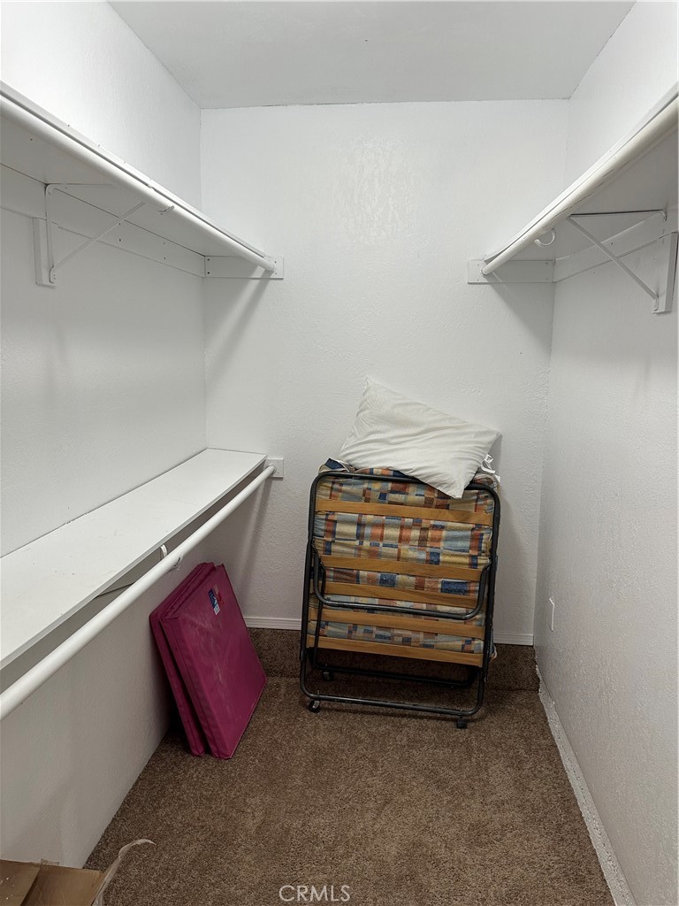 1380 Indian Sage Road Lancaster, CA 93534 - Photo 9 of 24 a view of room with racks