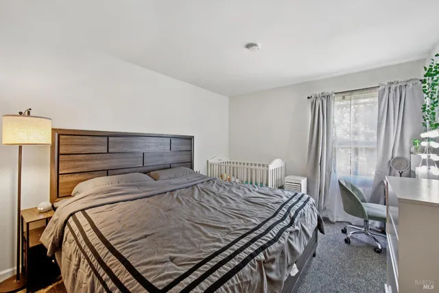 a view of a hallway with a white walls