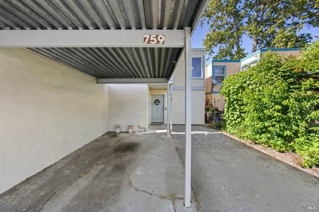 a front view of a house with a garage