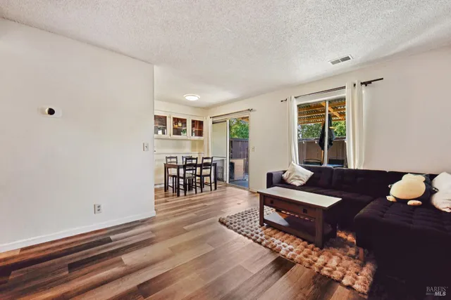 a work room with furniture and windows