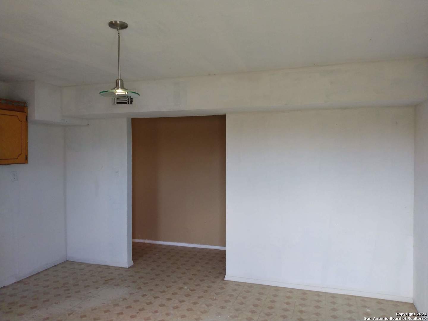 818 Austin Street Asherton, TX 78827 - Photo 13 of 15 a view of a hallway with a shower