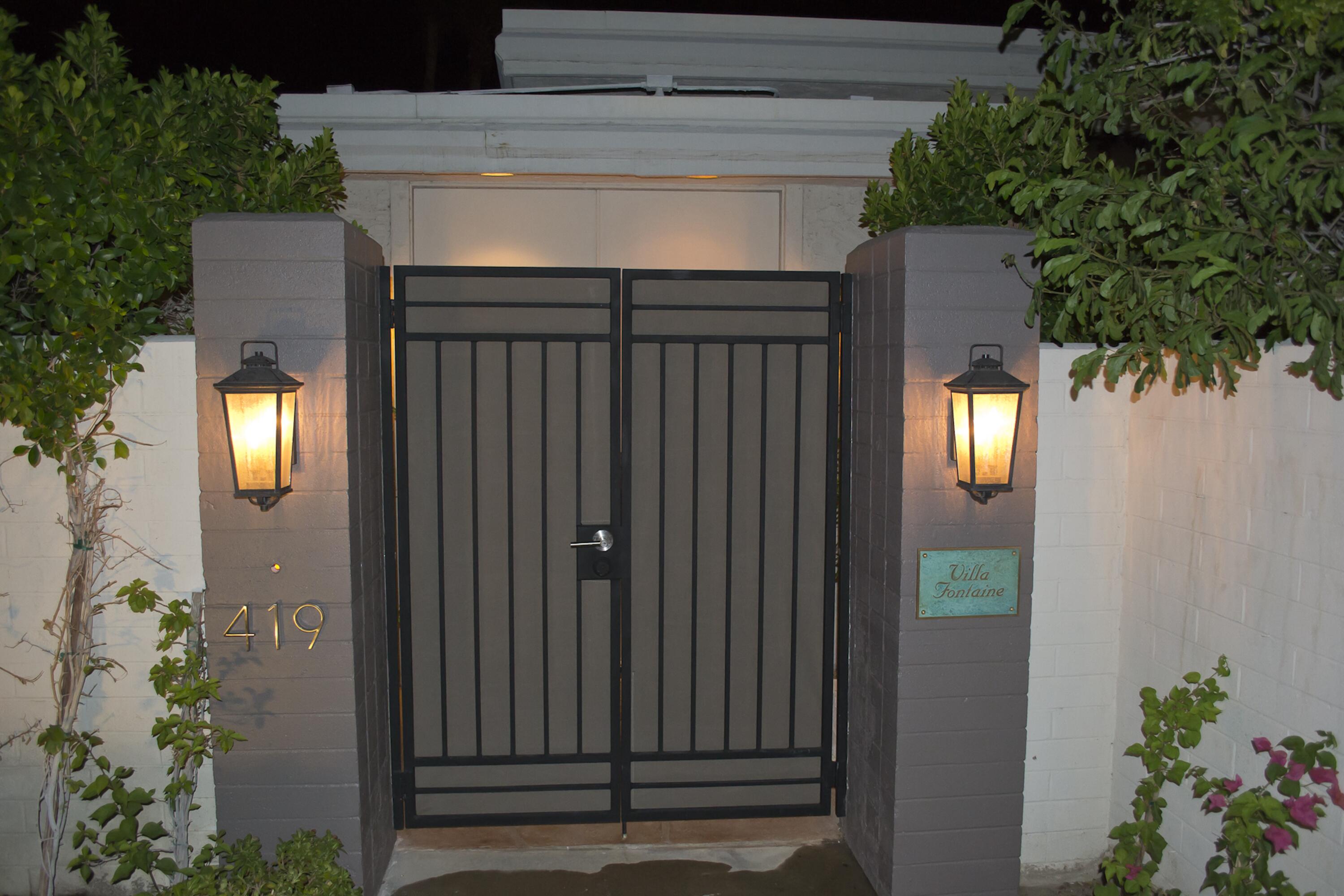 130 West Racquet Club Road, Unit 419 Palm Springs, CA 92262 - Photo 36 of 45 front gate