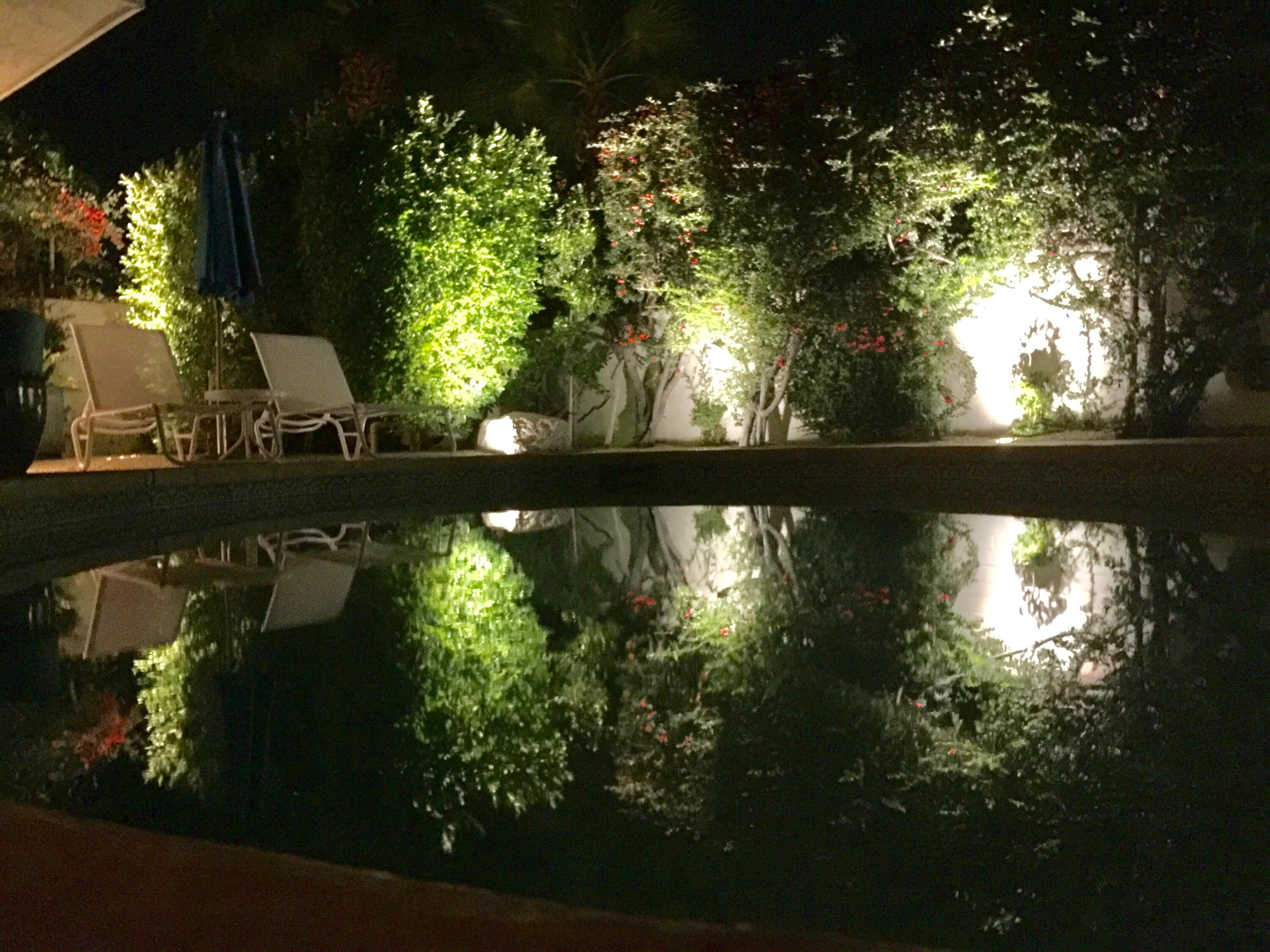 130 West Racquet Club Road, Unit 419 Palm Springs, CA 92262 - Photo 39 of 45 pool night