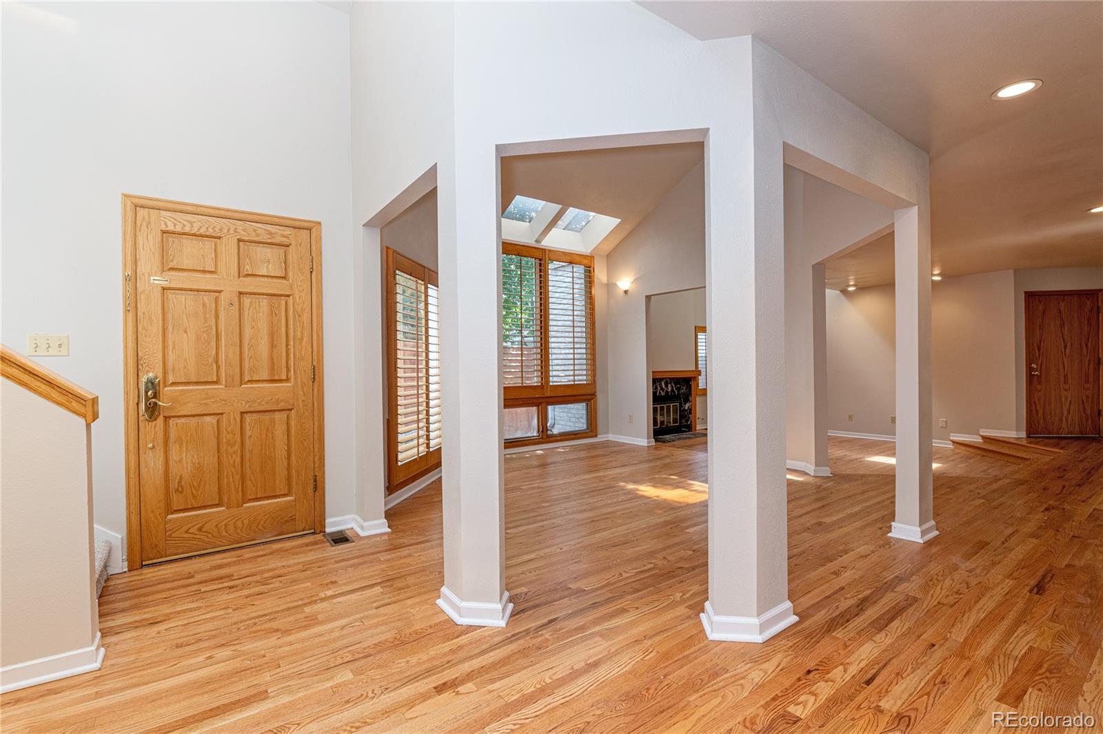 541 Monroe Street, Unit B Denver, CO 80206 - Photo 19 of 37 a view of a livingroom with wooden floor