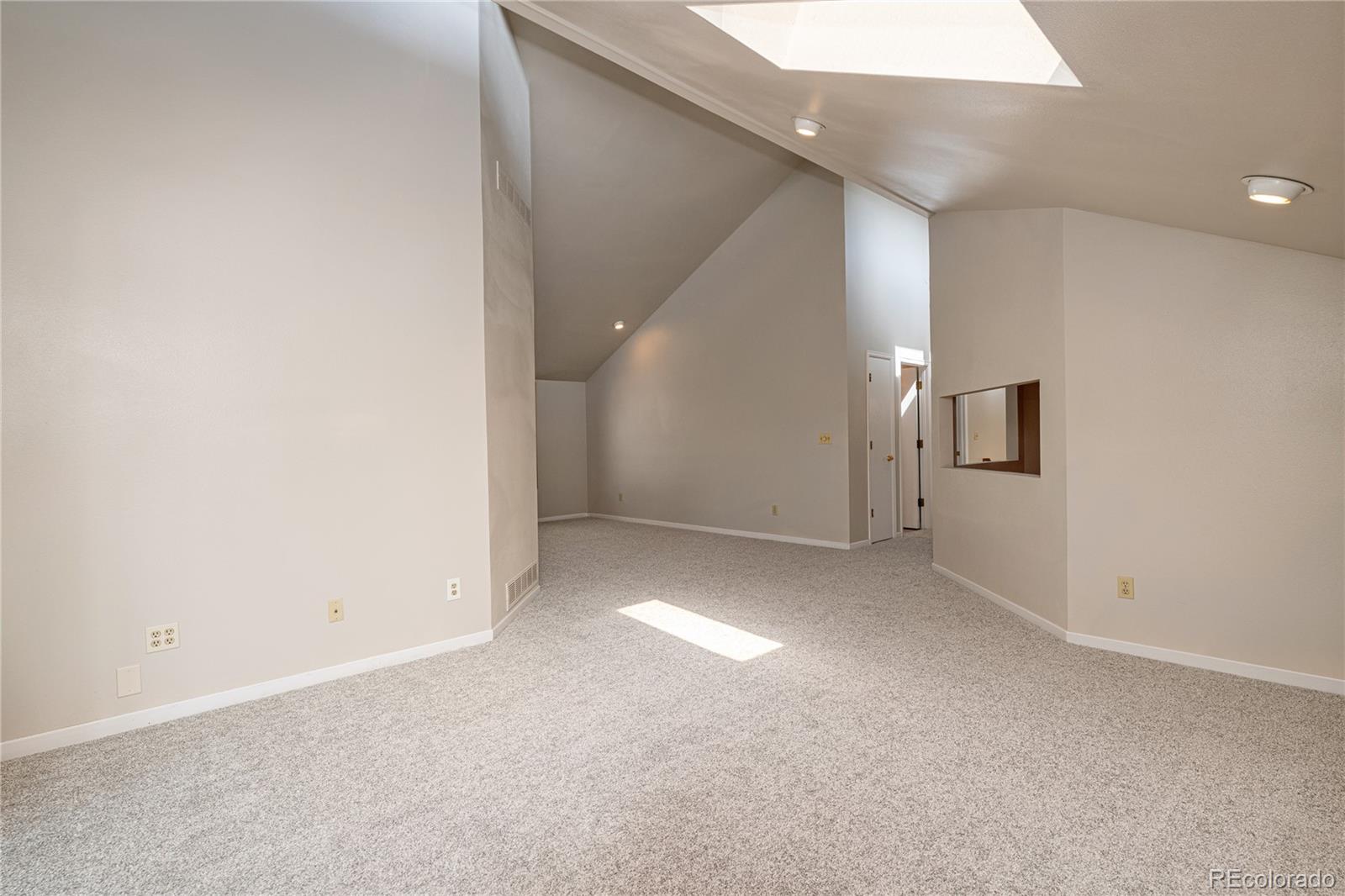 541 Monroe Street, Unit B Denver, CO 80206 - Photo 26 of 37 a view of a big room with entryway and stairs