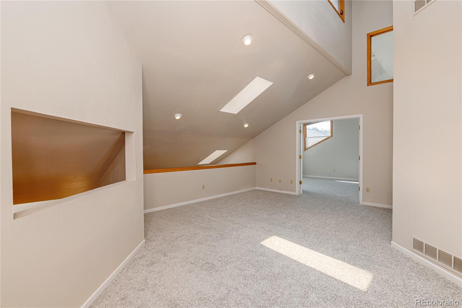 541 Monroe Street, Unit B Denver, CO 80206 - Photo 27 of 37 a view of an empty room with a window