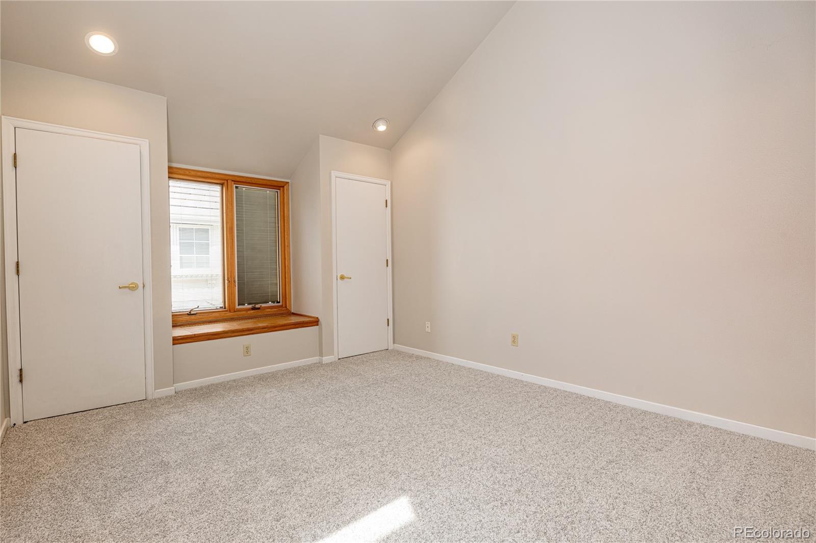 541 Monroe Street, Unit B Denver, CO 80206 - Photo 31 of 37 an empty room with windows