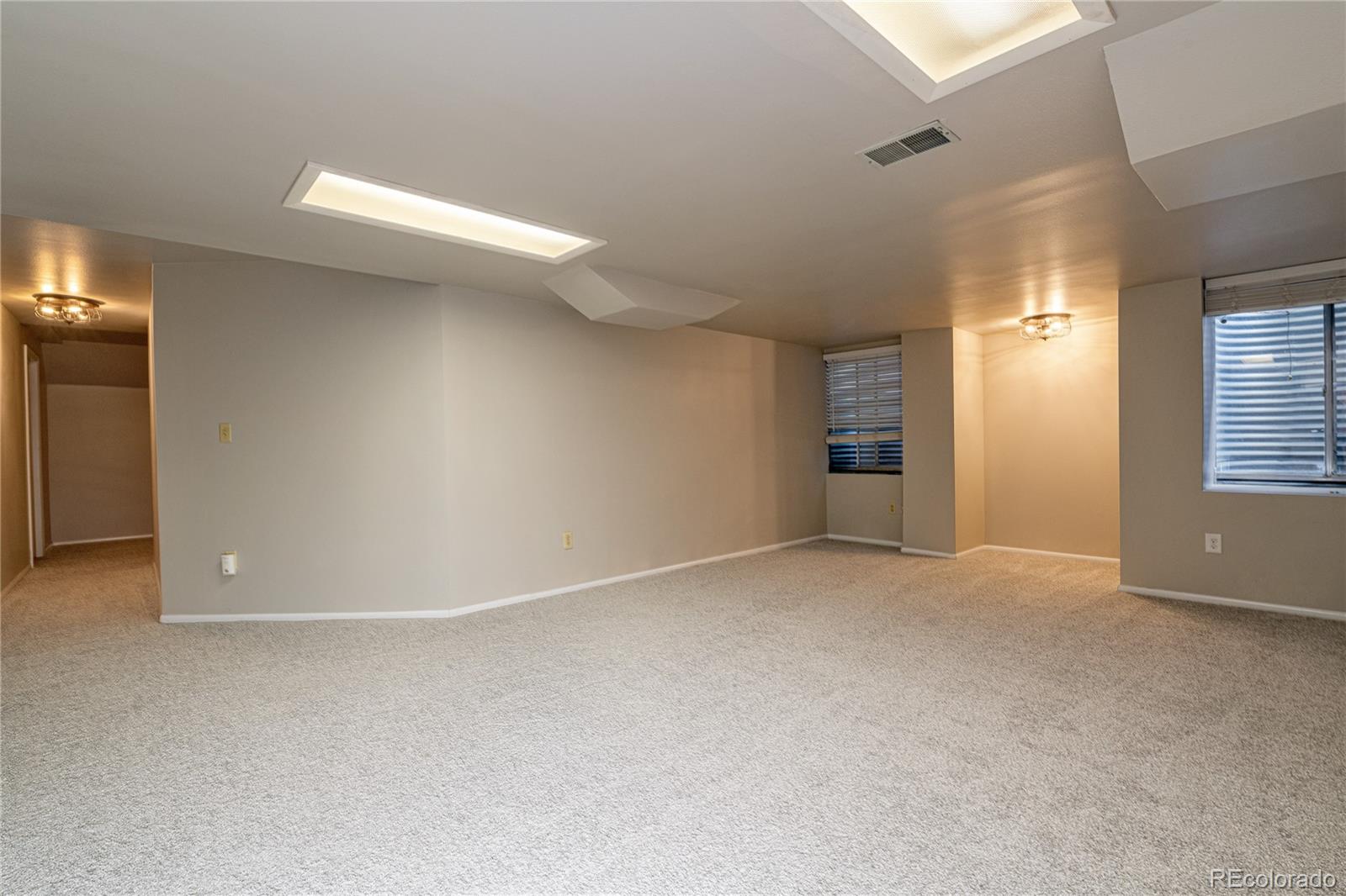 541 Monroe Street, Unit B Denver, CO 80206 - Photo 34 of 37 a view of an empty room with a window