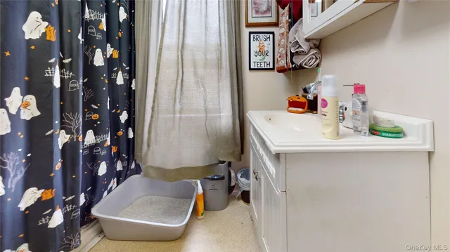 a kitchen with stainless steel appliances granite countertop a sink and a stove