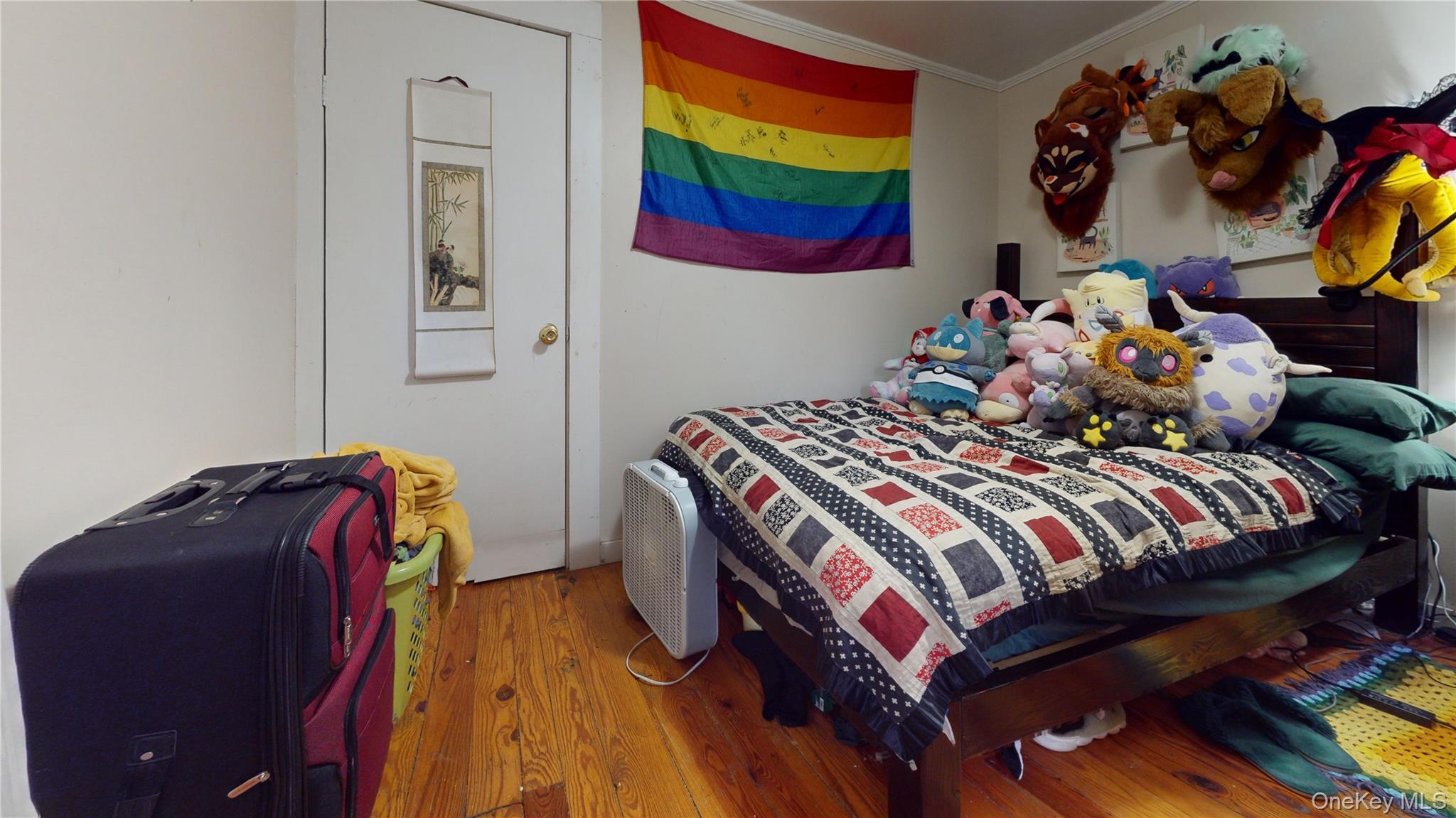 3 Center Street Deposit, NY 13754 - Photo 15 of 45 a bedroom with a bed and painting on the wall