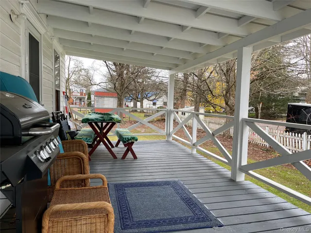 a room with furniture and a window
