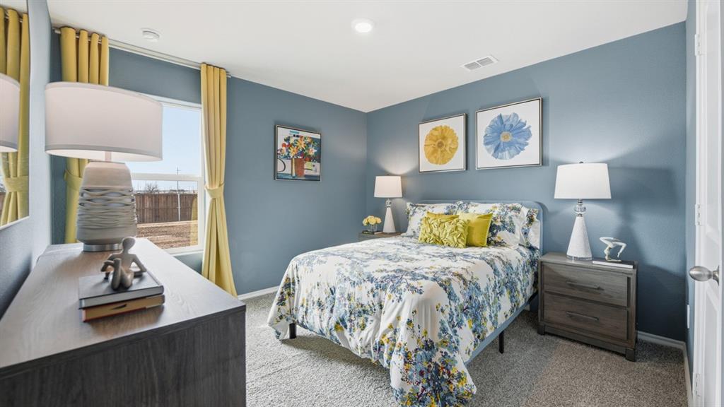 141 MLM Parkway Bridgeport, TX 76426 - Photo 25 of 35 a bedroom with a bed and a couch