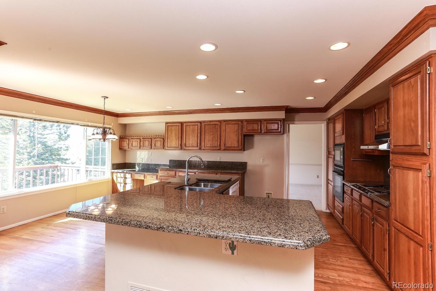1760 Thistle Ridge Road Highlands Ranch, CO 80126 - Photo 13 of 35