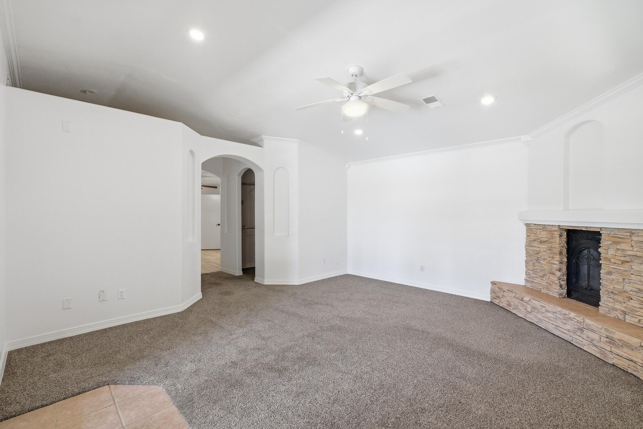 618 Birdsong Court Exeter, CA 93221 - Photo 42 of 62 wooden floor in an empty room with a fireplace