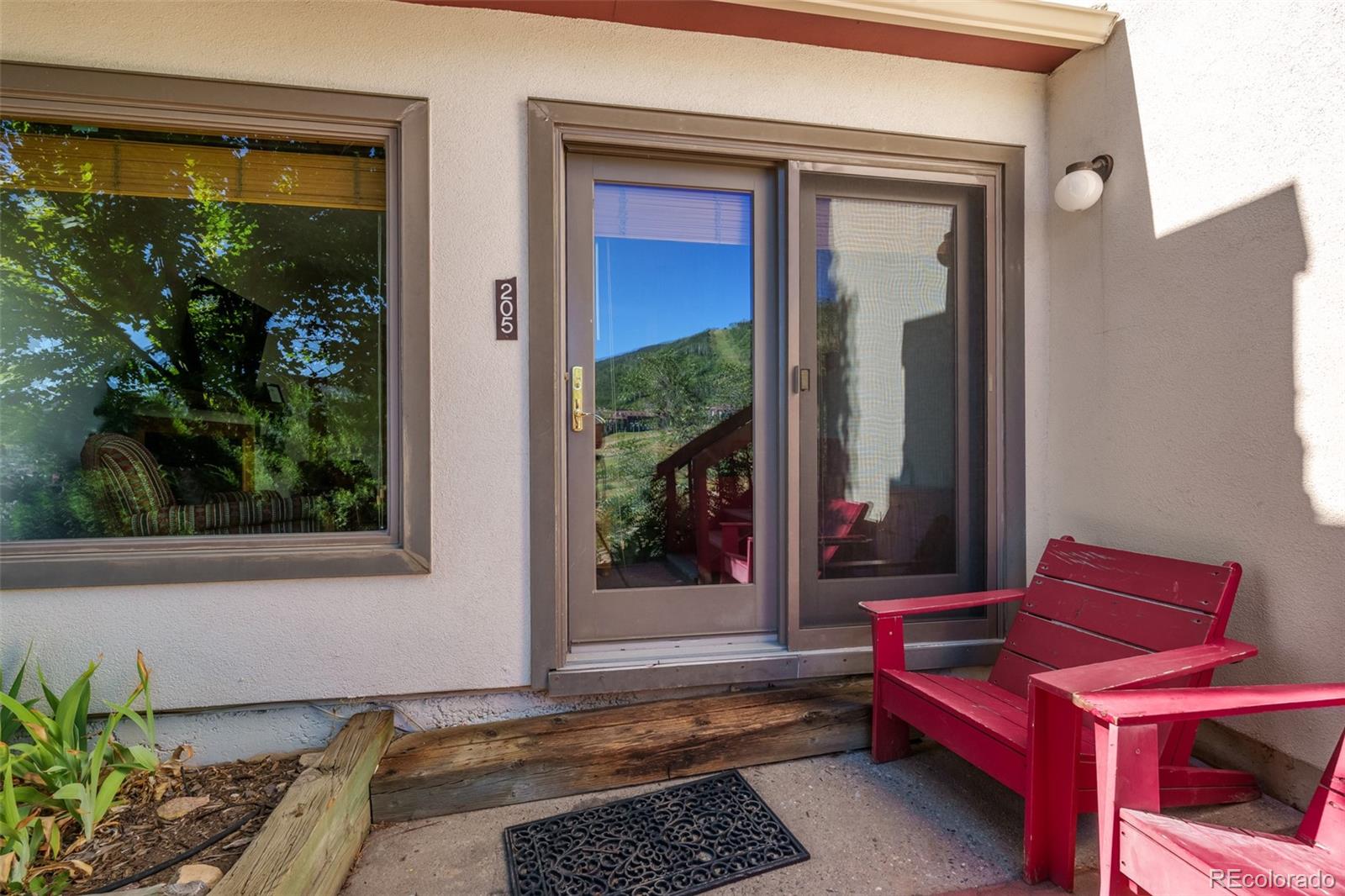 1800 Burgess Creek Road, Unit 205 Steamboat Springs, CO 80487 - Photo 25 of 28 a living room with furniture