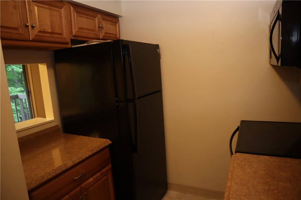 329 Ridge Point Circle, Unit 34 Bridgeville, PA 15017 - Photo 6 of 18 a close up of a microwave