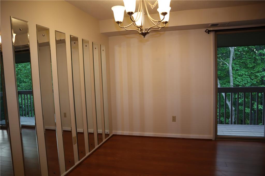 329 Ridge Point Circle, Unit 34 Bridgeville, PA 15017 - Photo 9 of 18 a view of a room with wooden floor and windows