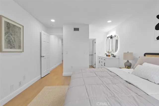 a room with a sink and a mirror