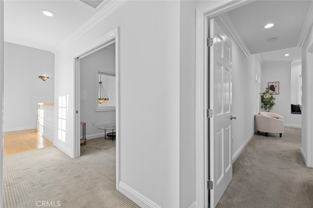 17131 Autumn Huntington Beach, CA 92647 - Photo 26 of 36 a view of a hallway with a livingroom and a livingroom