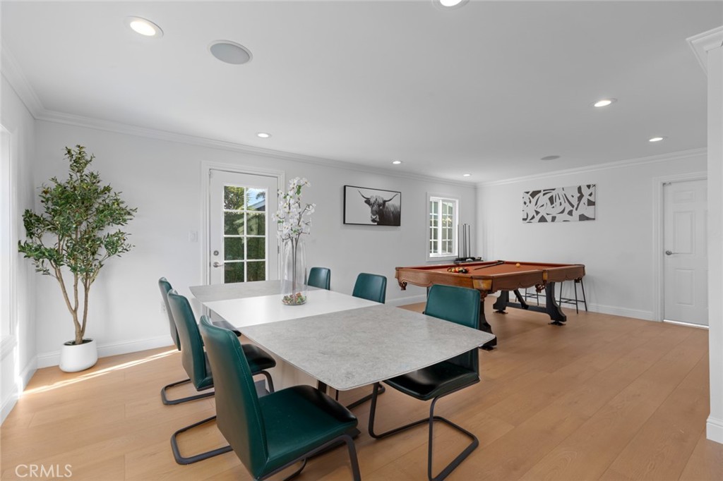 17131 Autumn Huntington Beach, CA 92647 - Photo 8 of 36 a view of a dining room with furniture and a potted plant