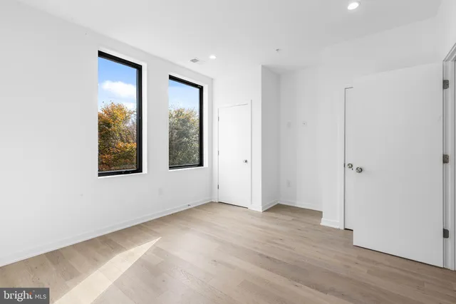 a kitchen with a sink and a microwave