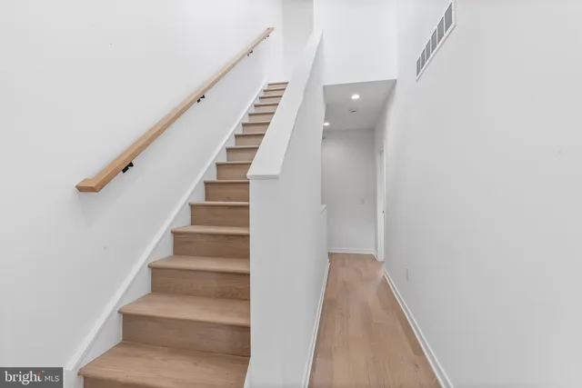 a view of a garden from a balcony