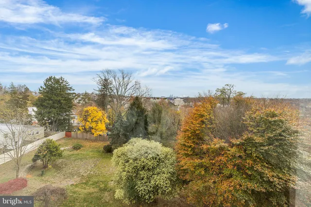 a view of room with wooden floor