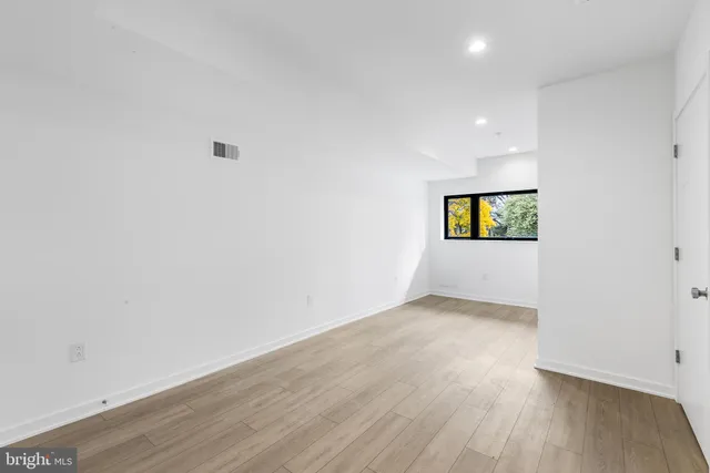 a view of a building with a street