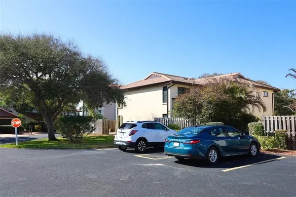 a view of a car parked in front of a house