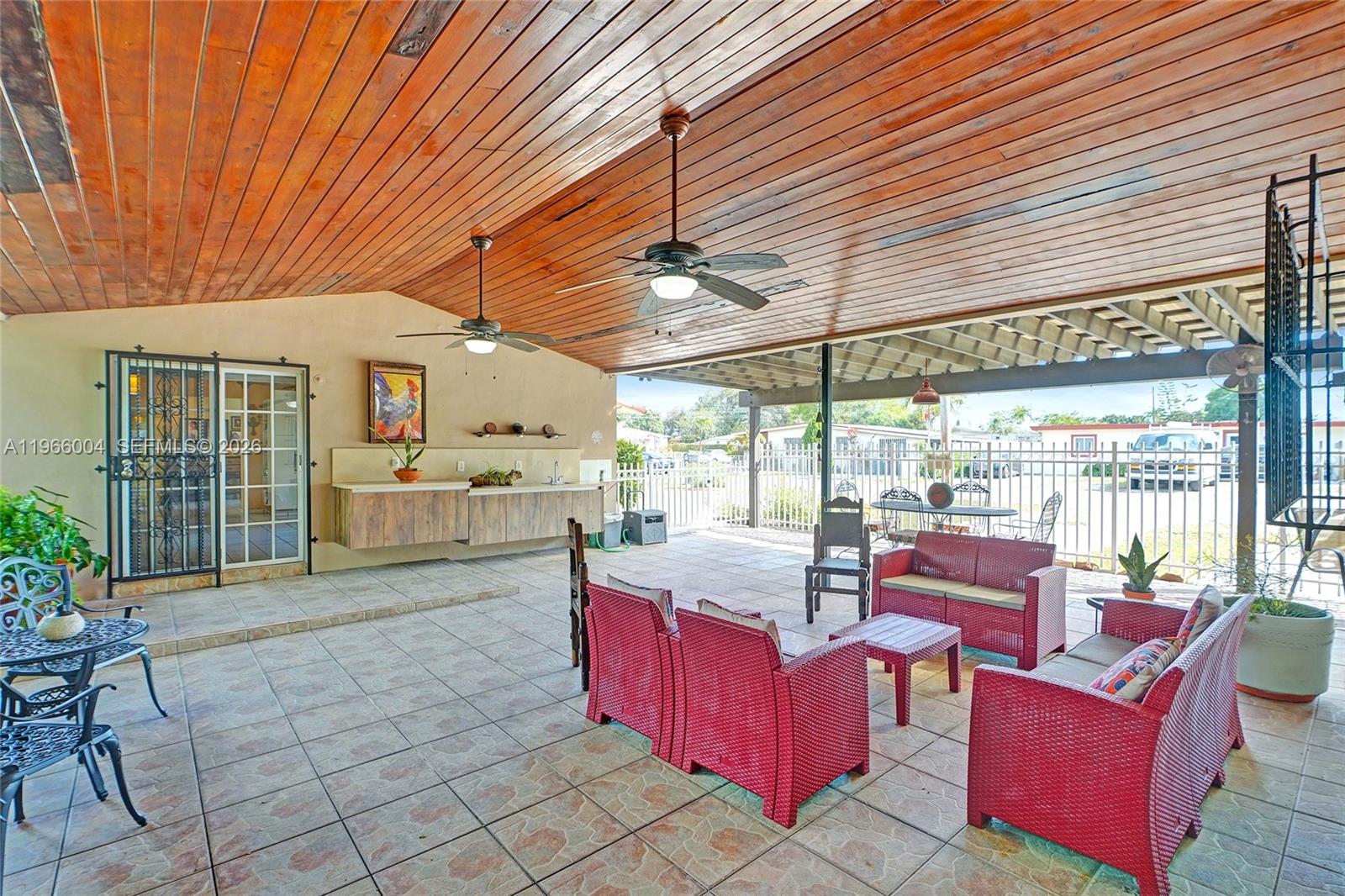 6501 Southwest 30th Street Miami, FL 33155 - Photo 1 of 36 ENORMOUS TERRACE WITH FLOATING CABINETS AND SINK FOR COOKOUTS.
