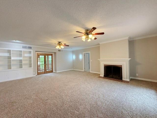 1001 North 3rd Street Lamesa, TX 79331 - Photo 19 of 32 a view of an empty room with a fireplace