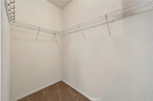 a view of an outdoor sitting area with furniture and wooden deck