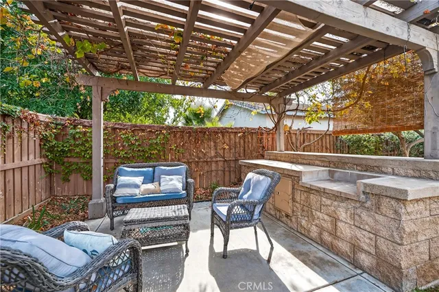 a view of a potted flower in the corridor