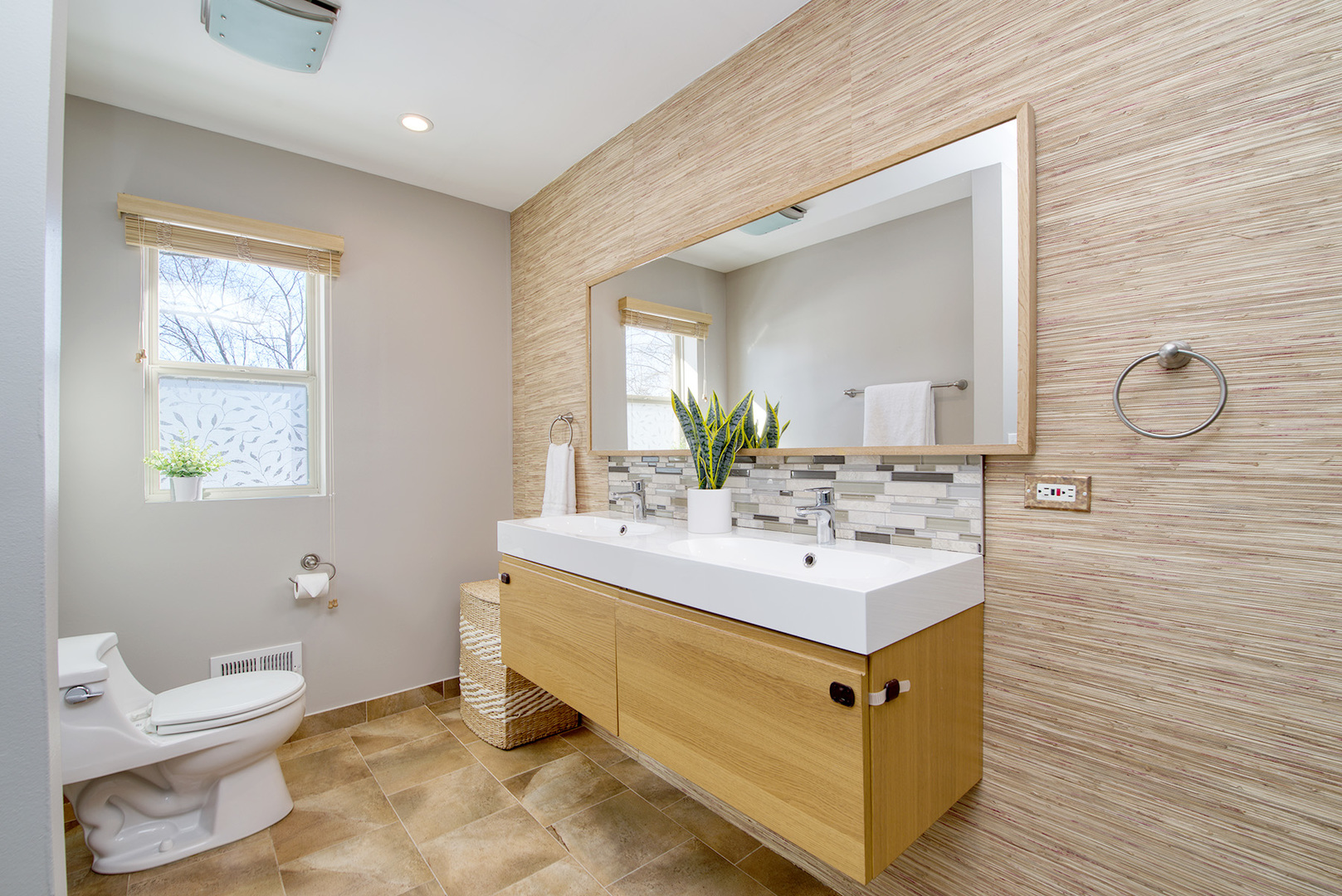 417 Warren Road Glenview, IL 60025 - Photo 11 of 24 a bathroom with a sink mirror and toilet