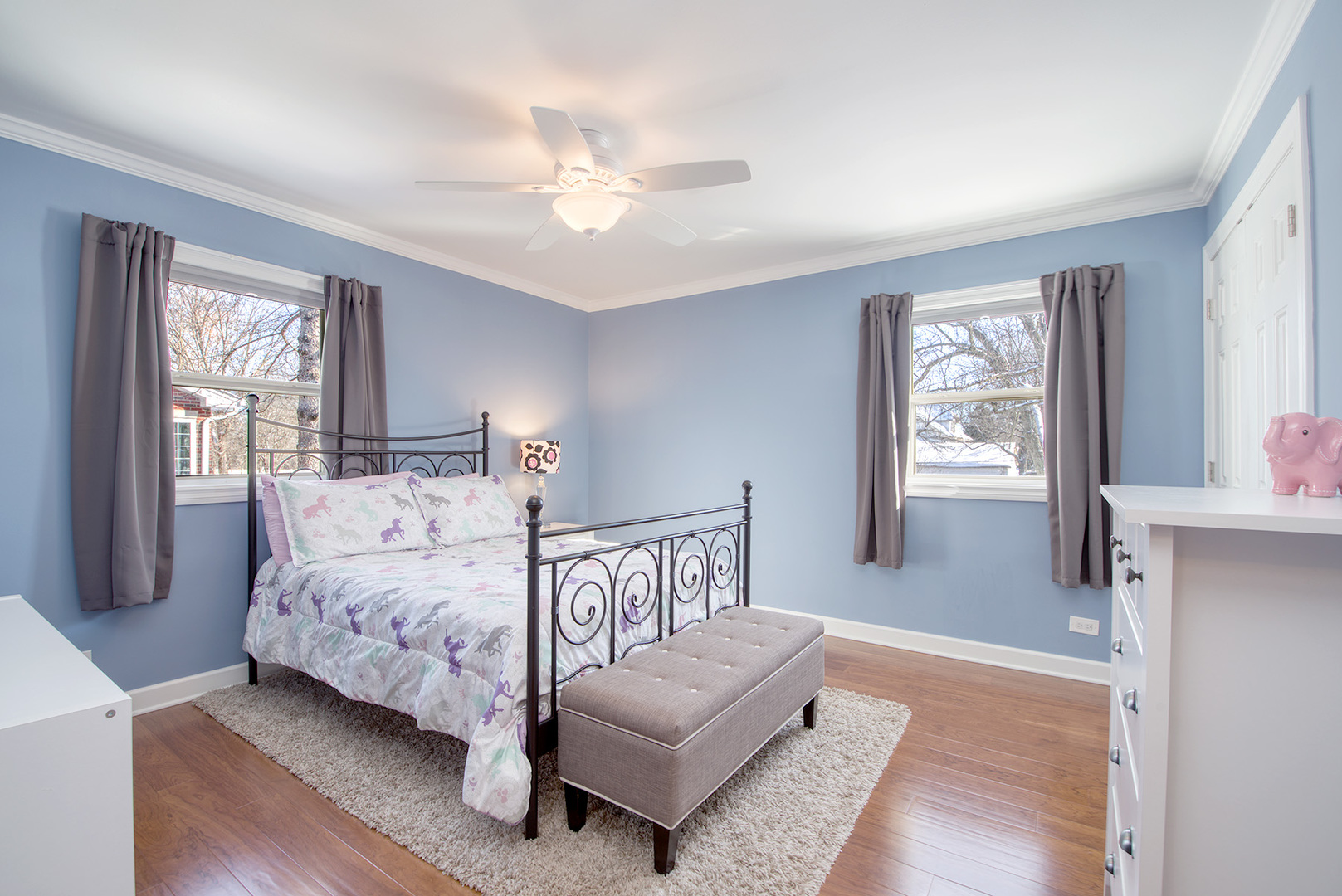 417 Warren Road Glenview, IL 60025 - Photo 13 of 24 a bedroom with a bed couch and windows