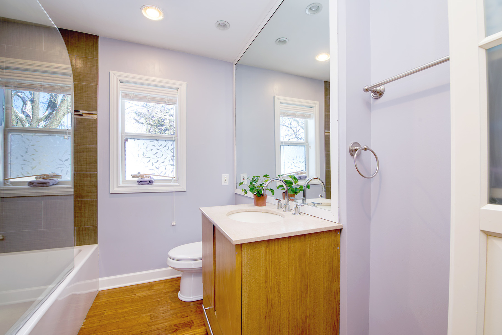 417 Warren Road Glenview, IL 60025 - Photo 15 of 24 a bathroom with a granite countertop sink toilet and shower