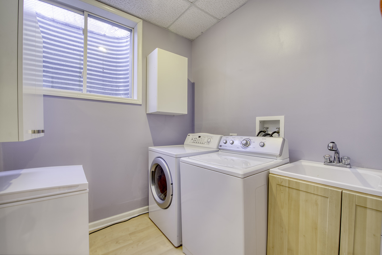 417 Warren Road Glenview, IL 60025 - Photo 21 of 24 a utility room with dryer and washer