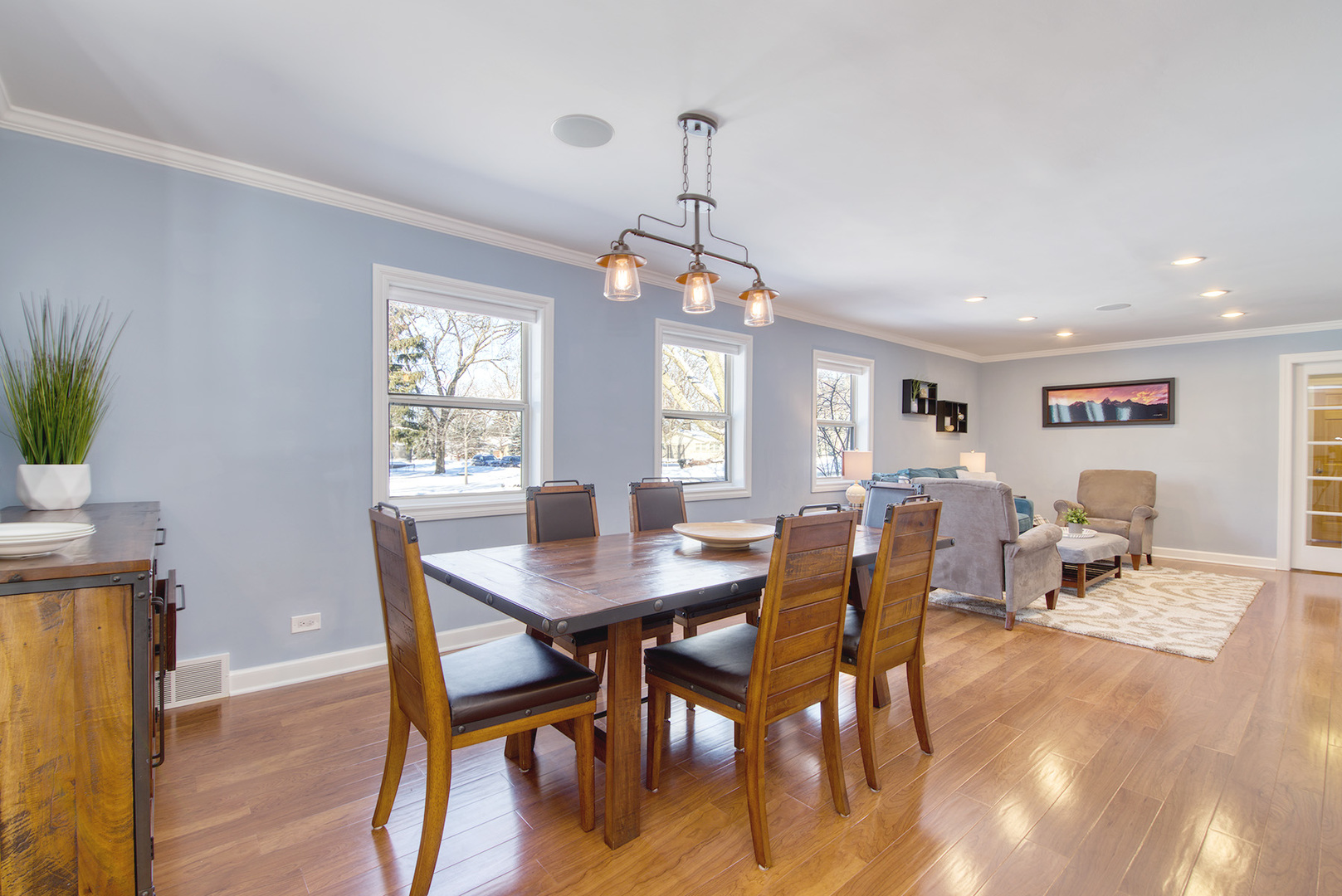 417 Warren Road Glenview, IL 60025 - Photo 6 of 24 a view of a dining room with furniture window and wooden floor